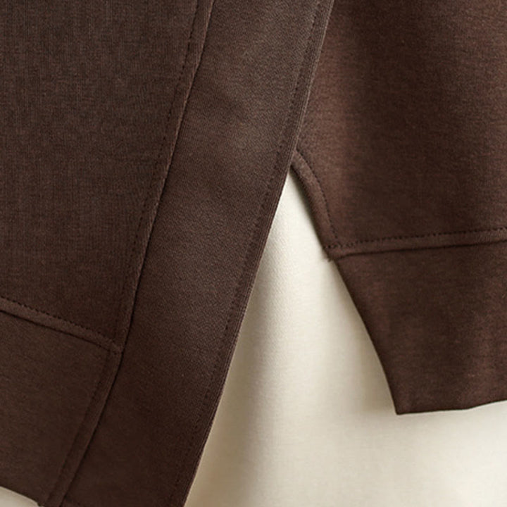 Bluza damska z bawełny z okrągłym dekoltem i długim rękawem w jednolitym kolorze i asymetrycznym wzorem "Buddha Stones Fall" - image 13