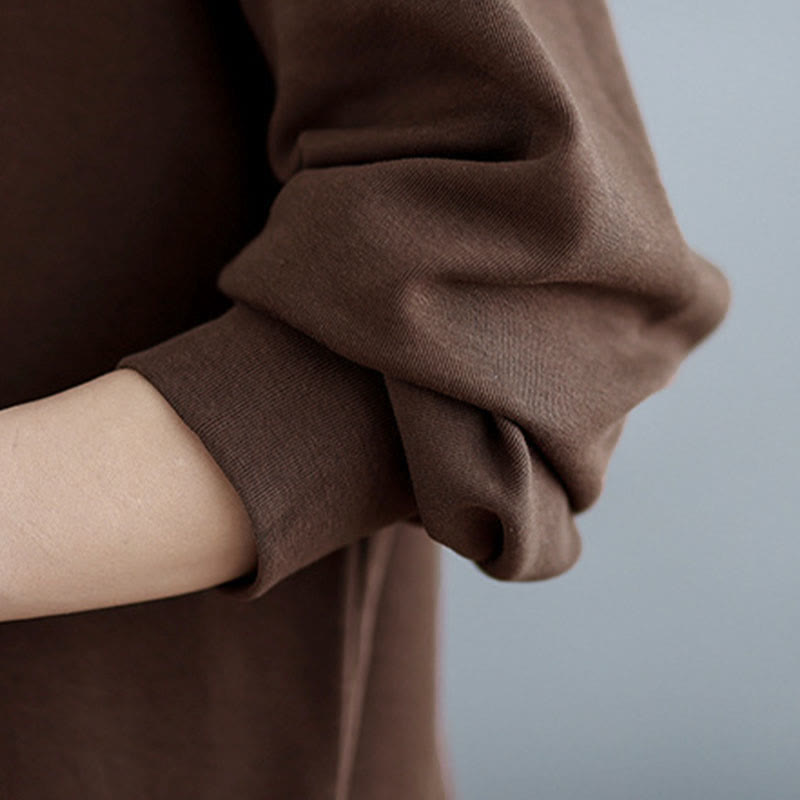 Bluza damska z bawełny z okrągłym dekoltem i długim rękawem w jednolitym kolorze i asymetrycznym wzorem "Buddha Stones Fall" - image 11