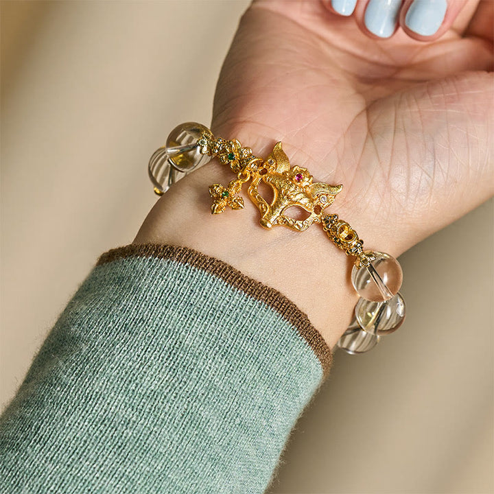 Bransoletka ochronna z białymi kryształkami i zawieszką z Buddha Stones w kształcie krzyża lisa - image 8