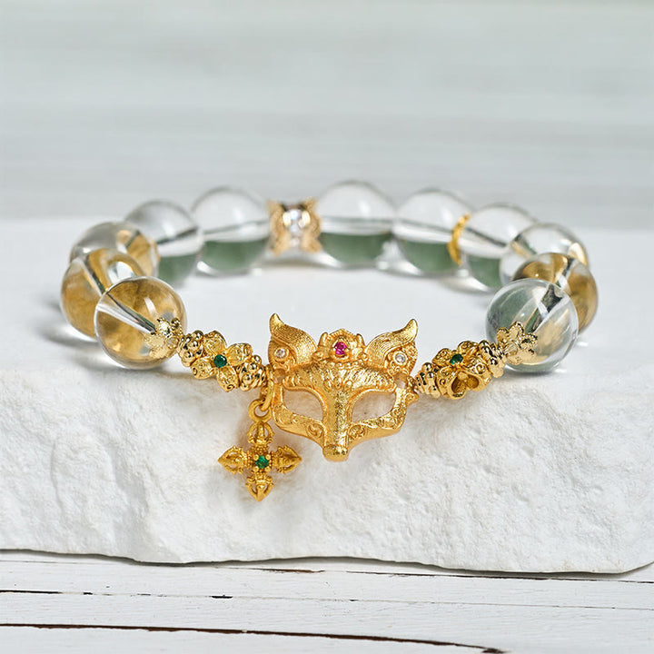 Bransoletka ochronna z białymi kryształkami i zawieszką z Buddha Stones w kształcie krzyża lisa - image 3