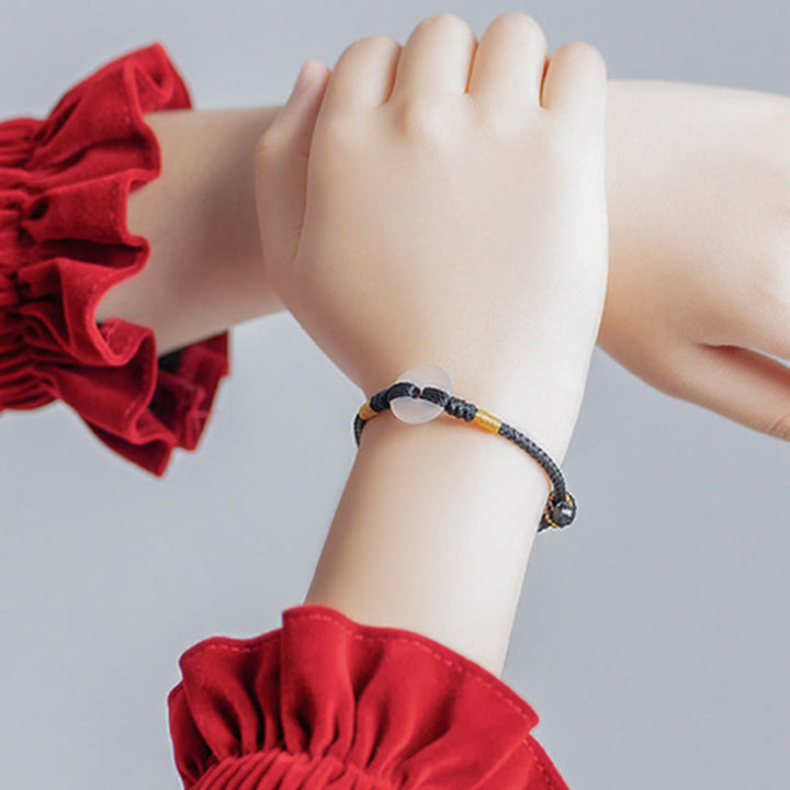 Bransoletka pleciona z białego chalcedonu i Buddha Stones z klamrą pokoju - image 13