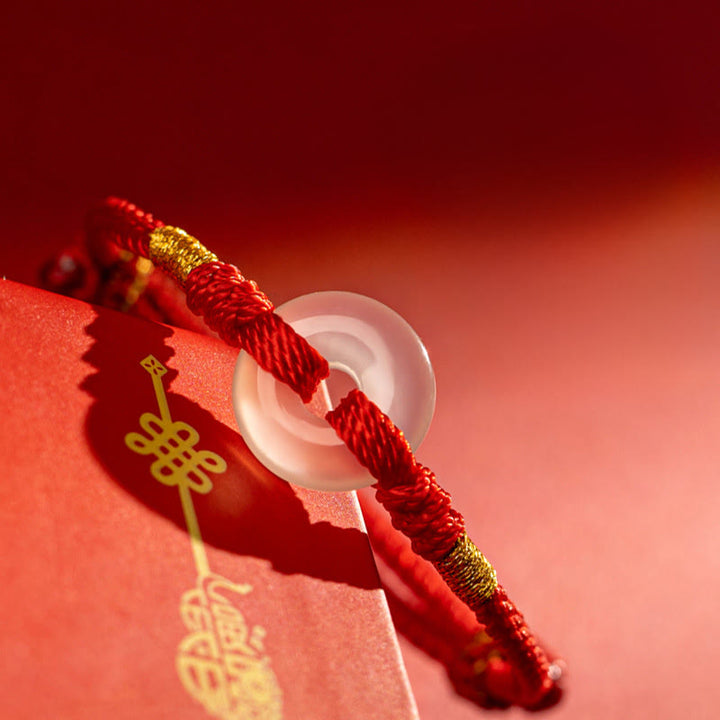 Bransoletka pleciona z białego chalcedonu i Buddha Stones z klamrą pokoju - image 2