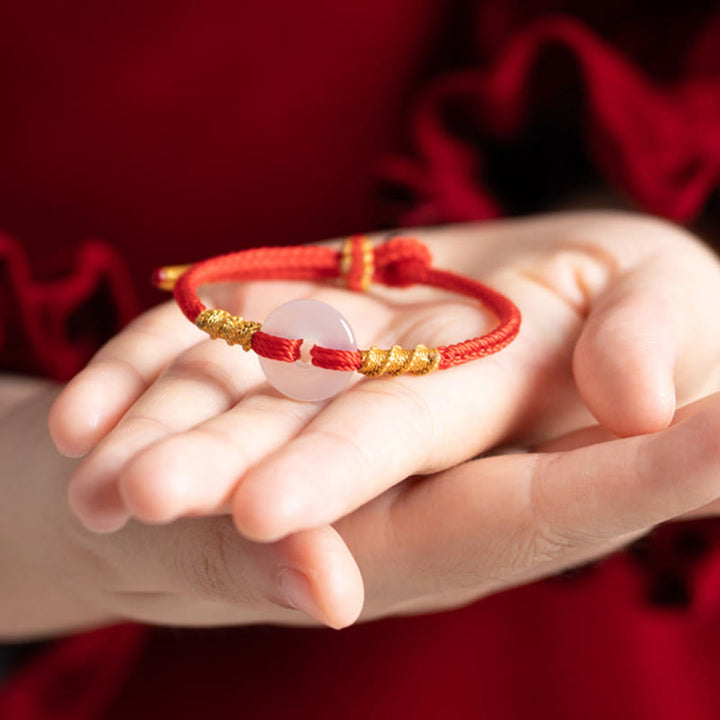 Bransoletka z białego chalcedonu i Buddha Stones z klamrą łączącą i węzłem liny - image 13