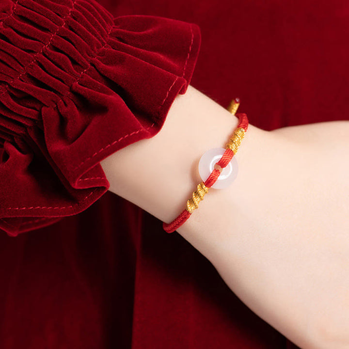 Bransoletka z białego chalcedonu i Buddha Stones z klamrą łączącą i węzłem liny - image 4