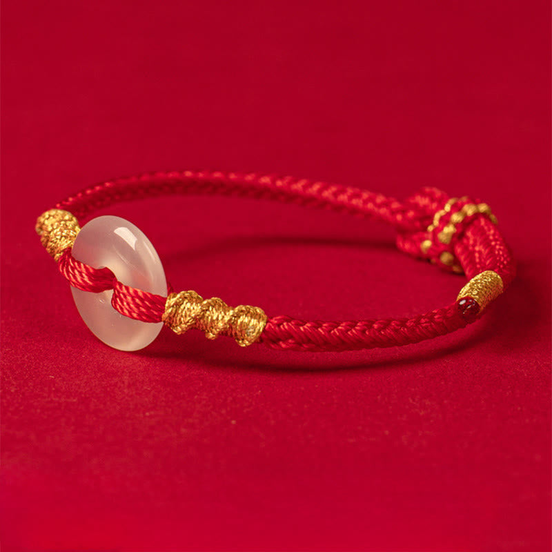 Bransoletka z białego chalcedonu i Buddha Stones z klamrą łączącą i węzłem liny - image 10