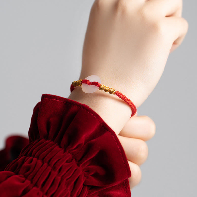 Bransoletka z białego chalcedonu i Buddha Stones z klamrą łączącą i węzłem liny - image 12