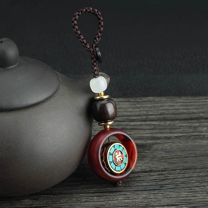 Buddha Stones, drewno hebanowe, sanskrycka, czterolistna koniczyna, oko Buddy, obrotowy brelok do kluczy - Wzór sanskrycki - image 0