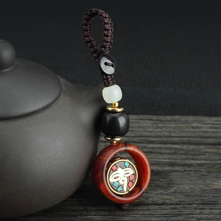 Buddha Stones, drewno hebanowe, sanskrycka, czterolistna koniczyna, oko Buddy, obrotowy brelok do kluczy - Wzór oka Buddy - image 6
