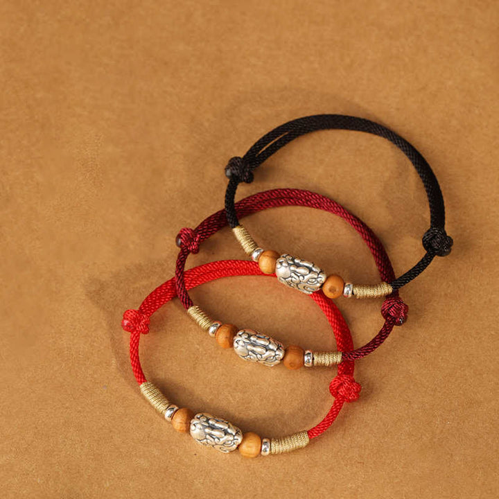 Bransoletka na Buddha Stones , zawieszką PiXiu ze srebra próby 999, koralikami z drewna brzoskwiniowego, ręcznie robioną, plecioną nicią szczęścia - image 22