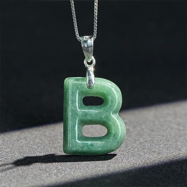Naszyjnik z wisiorkiem "Prosperity" z naturalnym jadeitem w kształcie litery AZ, wykonany ze srebra próby 925 i srebra próby 925. - image 13