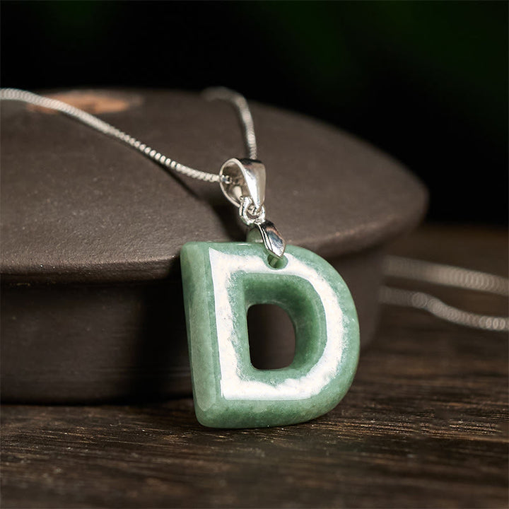 Naszyjnik z wisiorkiem "Prosperity" z naturalnym jadeitem w kształcie litery AZ, wykonany ze srebra próby 925 i srebra próby 925. - image 24