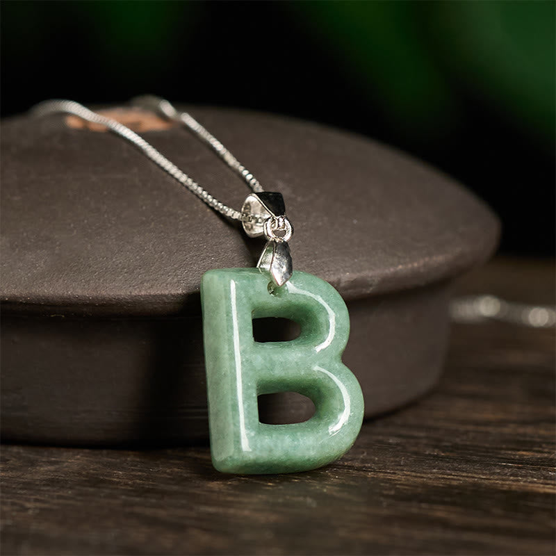 Naszyjnik z wisiorkiem "Prosperity" z naturalnym jadeitem w kształcie litery AZ, wykonany ze srebra próby 925 i srebra próby 925. - image 11