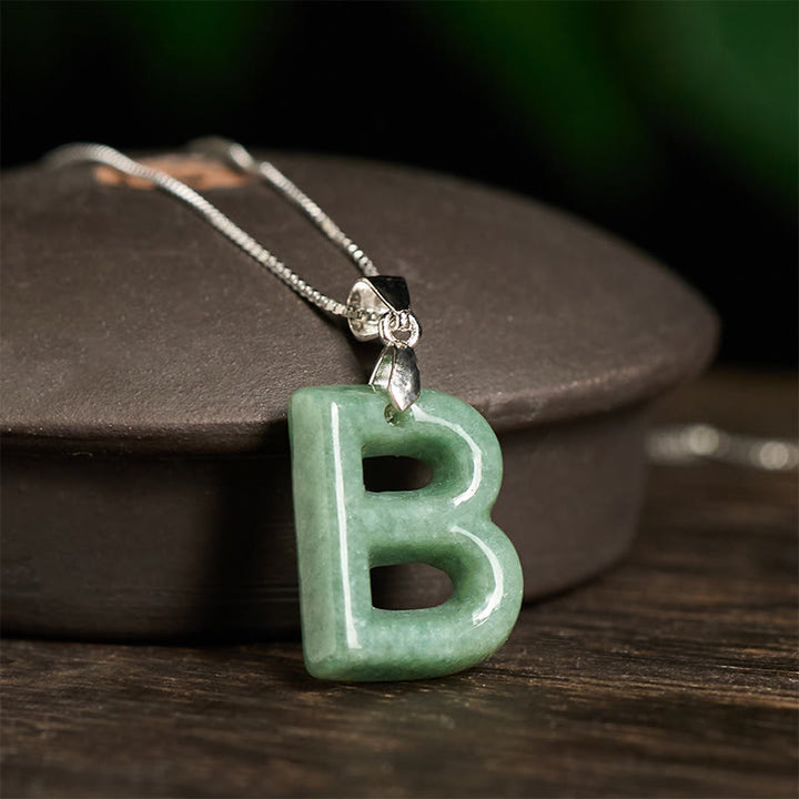 Naszyjnik z wisiorkiem "Prosperity" z naturalnym jadeitem w kształcie litery AZ, wykonany ze srebra próby 925 i srebra próby 925. - image 11