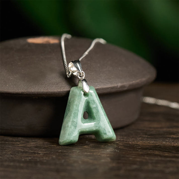 Naszyjnik z wisiorkiem "Prosperity" z naturalnym jadeitem w kształcie litery AZ, wykonany ze srebra próby 925 i srebra próby 925. - image 3