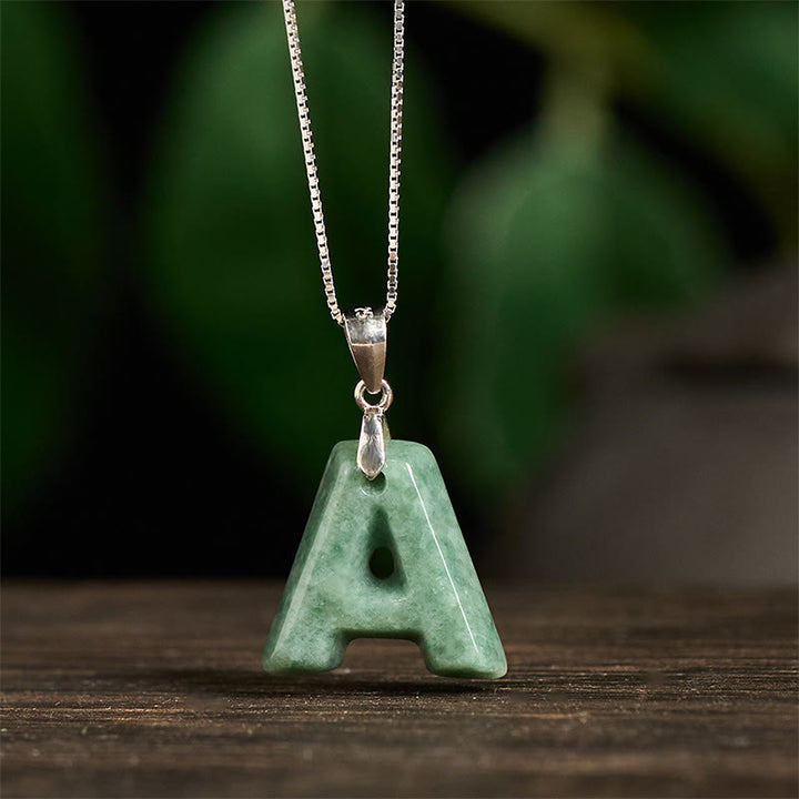 Naszyjnik z wisiorkiem "Prosperity" z naturalnym jadeitem w kształcie litery AZ, wykonany ze srebra próby 925 i srebra próby 925. - image 2
