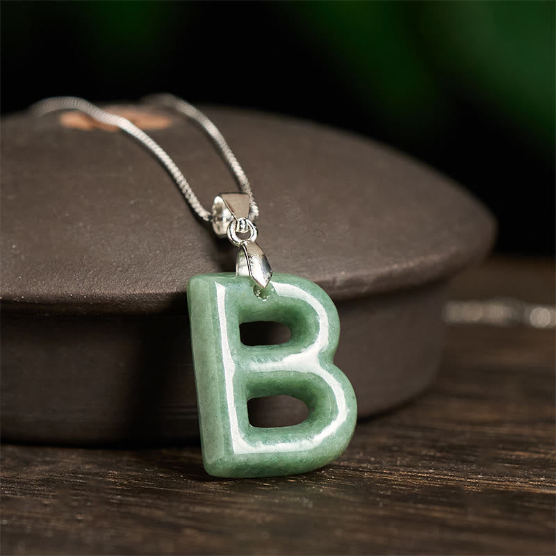 Naszyjnik z wisiorkiem "Prosperity" z naturalnym jadeitem w kształcie litery AZ, wykonany ze srebra próby 925 i srebra próby 925. - image 12
