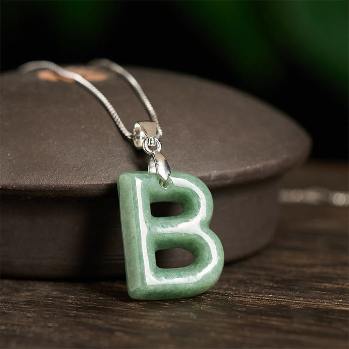 Naszyjnik z wisiorkiem "Prosperity" z naturalnym jadeitem w kształcie litery AZ, wykonany ze srebra próby 925 i srebra próby 925. - image 12