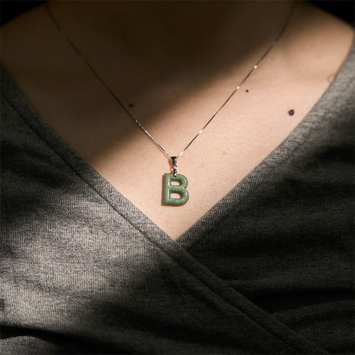 Naszyjnik z wisiorkiem "Prosperity" z naturalnym jadeitem w kształcie litery AZ, wykonany ze srebra próby 925 i srebra próby 925. - image 15