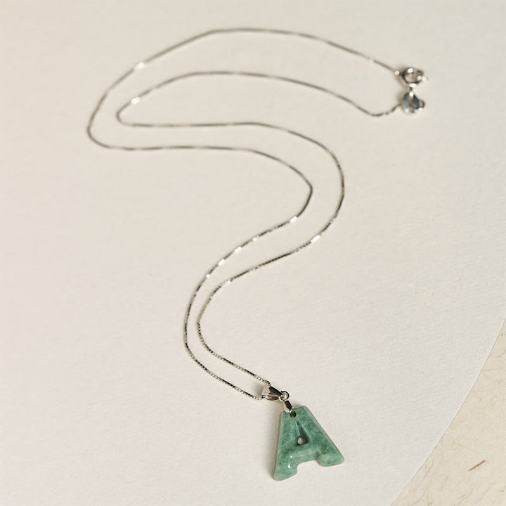 Naszyjnik z wisiorkiem "Prosperity" z naturalnym jadeitem w kształcie litery AZ, wykonany ze srebra próby 925 i srebra próby 925. - image 5