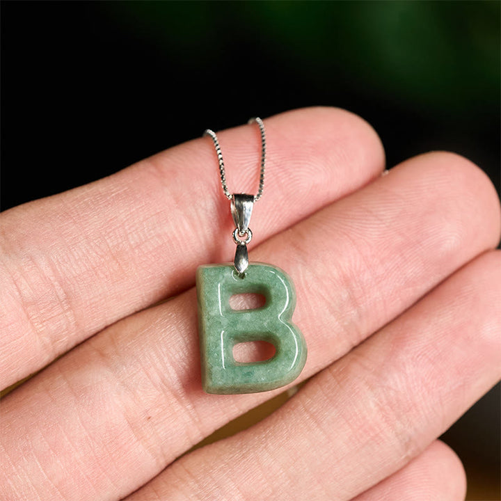 Naszyjnik z wisiorkiem "Prosperity" z naturalnym jadeitem w kształcie litery AZ, wykonany ze srebra próby 925 i srebra próby 925. - image 14