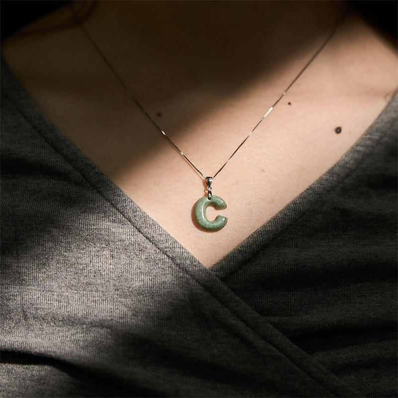 Naszyjnik z wisiorkiem "Prosperity" z naturalnym jadeitem w kształcie litery AZ, wykonany ze srebra próby 925 i srebra próby 925. - image 21