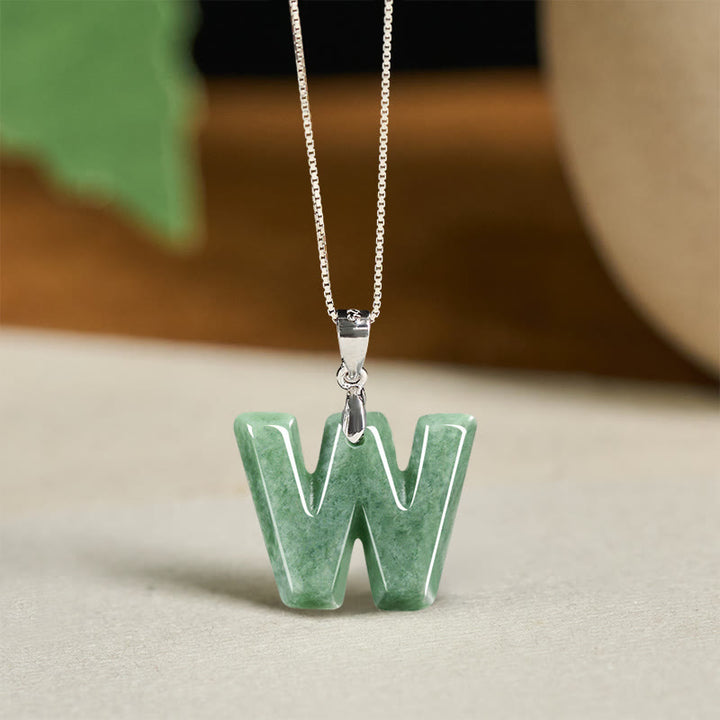 Naszyjnik z wisiorkiem "Prosperity" z naturalnym jadeitem w kształcie litery AZ, wykonany ze srebra próby 925 i srebra próby 925. - W - image 46
