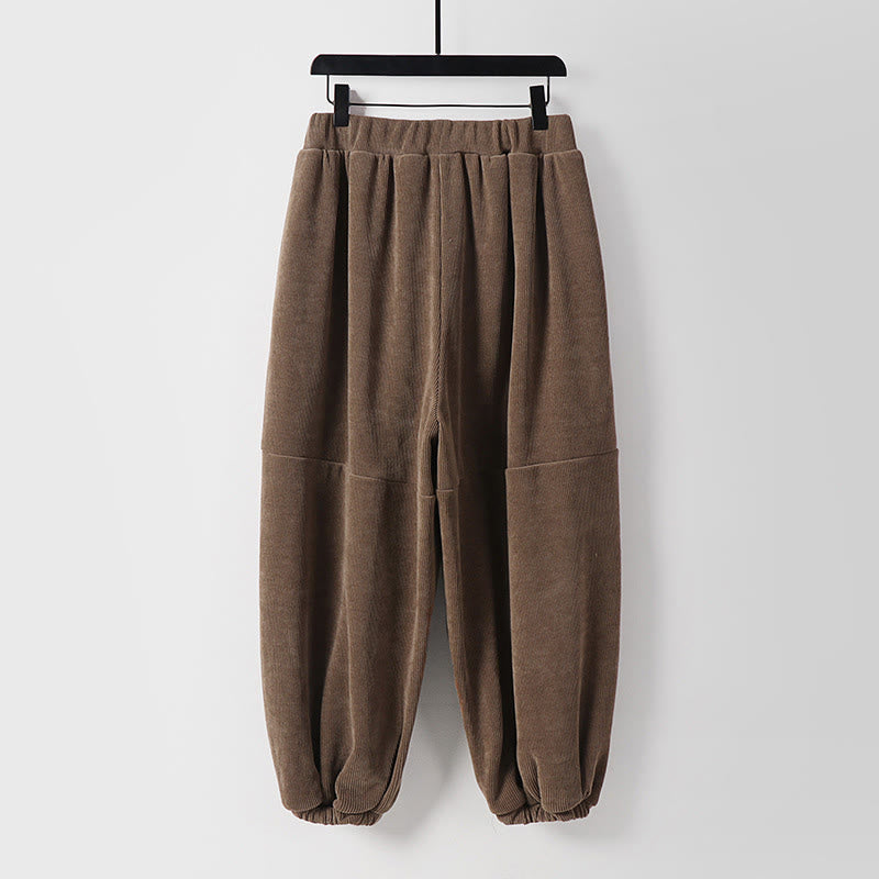 Męskie spodnie haremowe z bawełny sztruksowej z kieszeniami i sznurowanymi w jednolitym kolorze z Buddha Stones - image 1