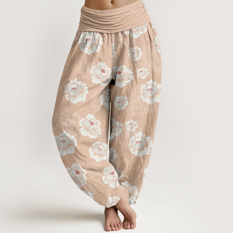 Eleganckie, damskie spodnie haremowe z elastyczną talią i wzorem w białe kwiaty z motywem Buddha Stones - PeachPuff - US16, UK/AU20, EU48 (3XL) - image 0