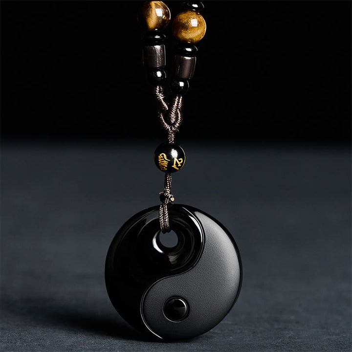 Buddha Stones Yin Yang z symbolem Om Mani Padme Hum i czarnym obsydianem. Wisiorek. - image 2