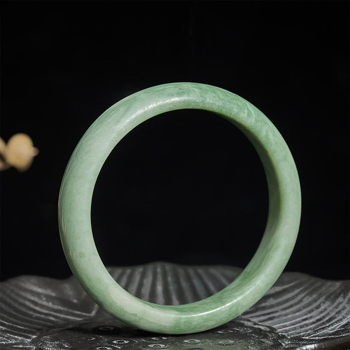 Bransoletka z naturalnym jadeitem i Buddha Stones, prosta w konstrukcji, z mankietem i napisem „Prosperity” - image 1