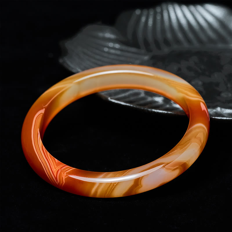 Bransoletka z Buddha Stones z żyłkowanym wzorem i spokojnym czerwonym agatem - image 1