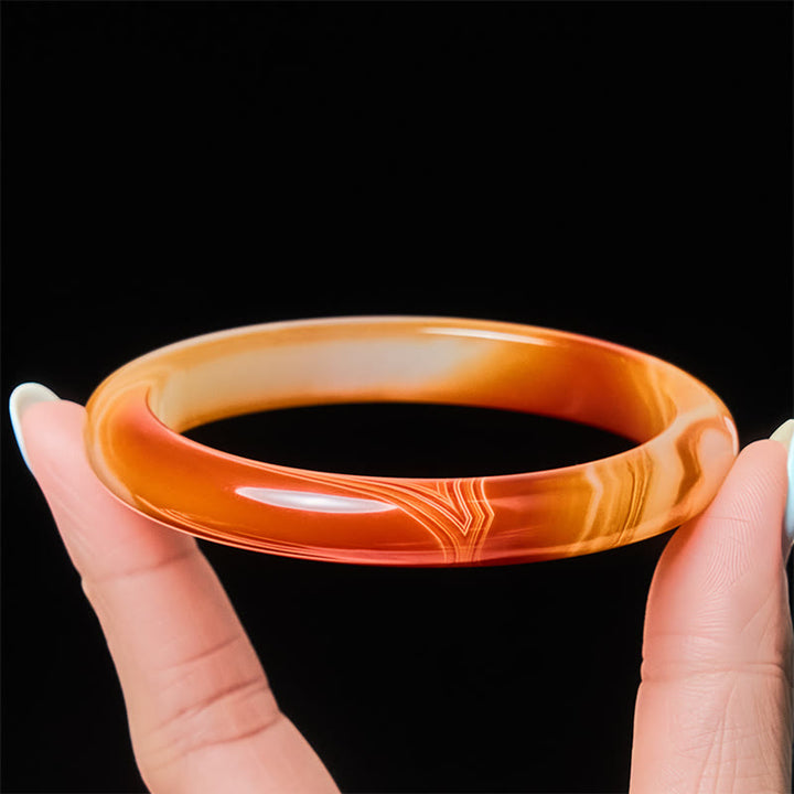 Bransoletka z Buddha Stones z żyłkowanym wzorem i spokojnym czerwonym agatem - image 3