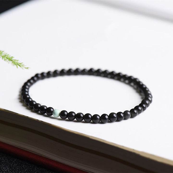 Bransoletka z Buddha Stones z czarnego obsydianu i turkusu, zapewniająca spełnienie siły - image 3