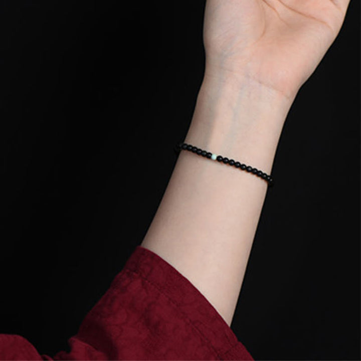 Bransoletka z Buddha Stones z czarnego obsydianu i turkusu, zapewniająca spełnienie siły - image 7