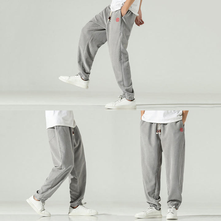 Męskie spodnie haremowe z kieszeniami i gładkim sztruksowym haftem "Buddha Stones Fall" - image 22