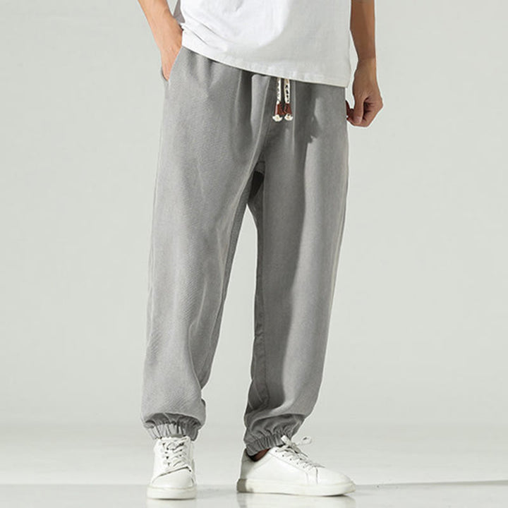 Męskie spodnie haremowe z kieszeniami i gładkim sztruksowym haftem "Buddha Stones Fall" - image 21