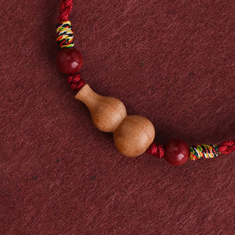 Bransoletka z regulowanym sznurkiem i Buddha Stones, tykwą i drewnem brzoskwiniowym, zapewniająca bogactwo i szczęście - image 1