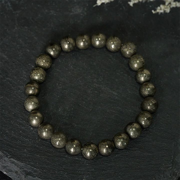 Bransoletka z okrągłych koralików pirytu i Buddha Stones, pewność siebie i obfitość - Piryt (obwód nadgarstka: 15-16 cm) - image 0