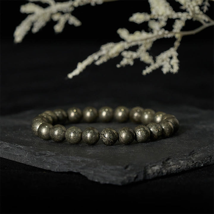 Bransoletka z okrągłych koralików pirytu i Buddha Stones, pewność siebie i obfitość - image 1