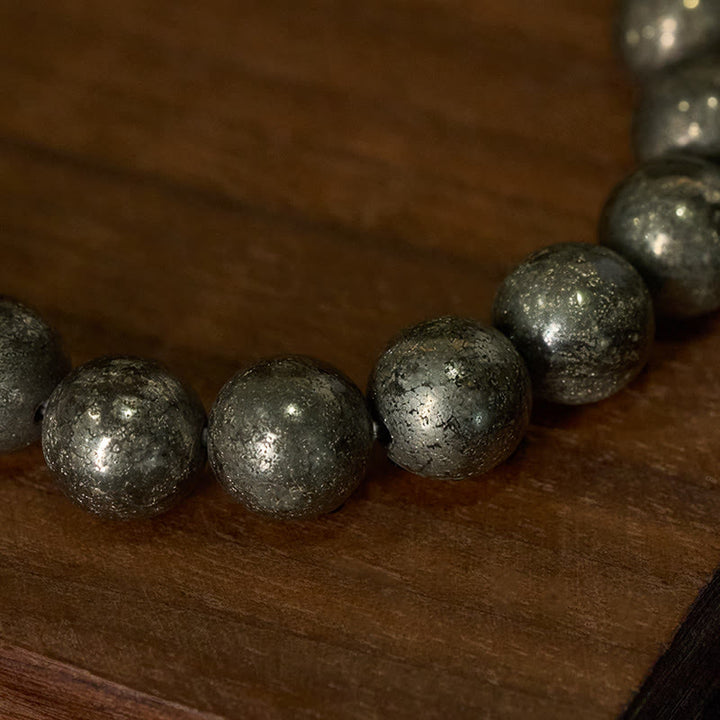 Bransoletka z okrągłych koralików pirytu i Buddha Stones, pewność siebie i obfitość - image 3