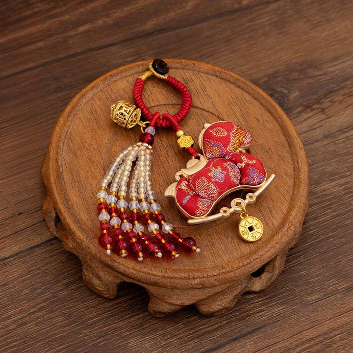 Buddha Stones Brelok do kluczy z haftem Rok Konia, dobrobyt - Czerwony koń (rozmiar: 10*5 cm) - image 0