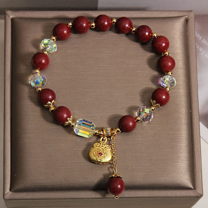 Buddha Stones Bransoletka lecznicza z zawieszką na woreczek z drzewa sandałowego - image 1