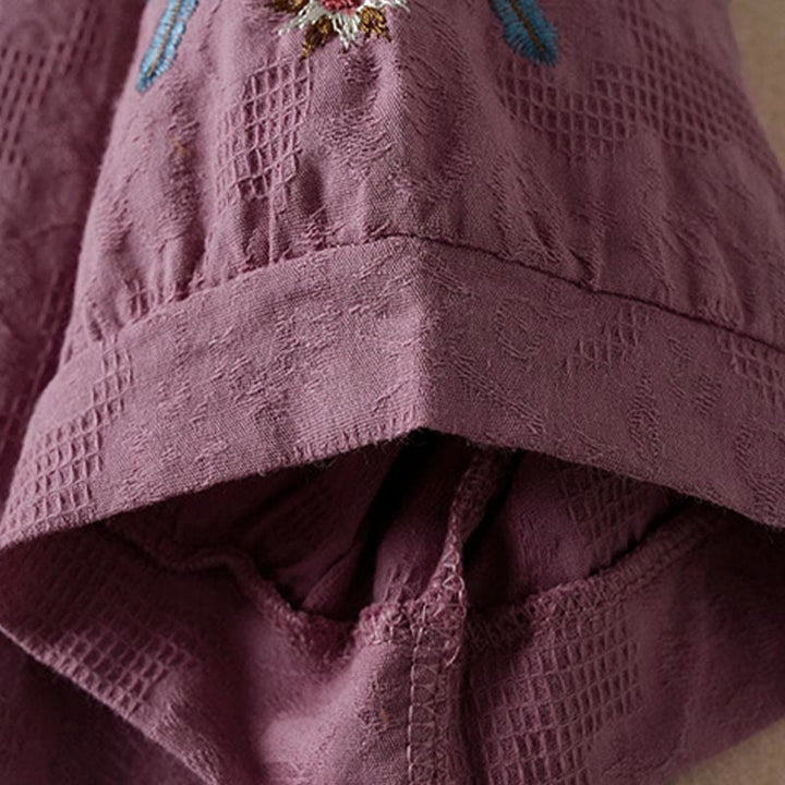 Buddha Stones Luźna damska bawełniana koszulka z klapami i kwiatowym wzorem - image 3