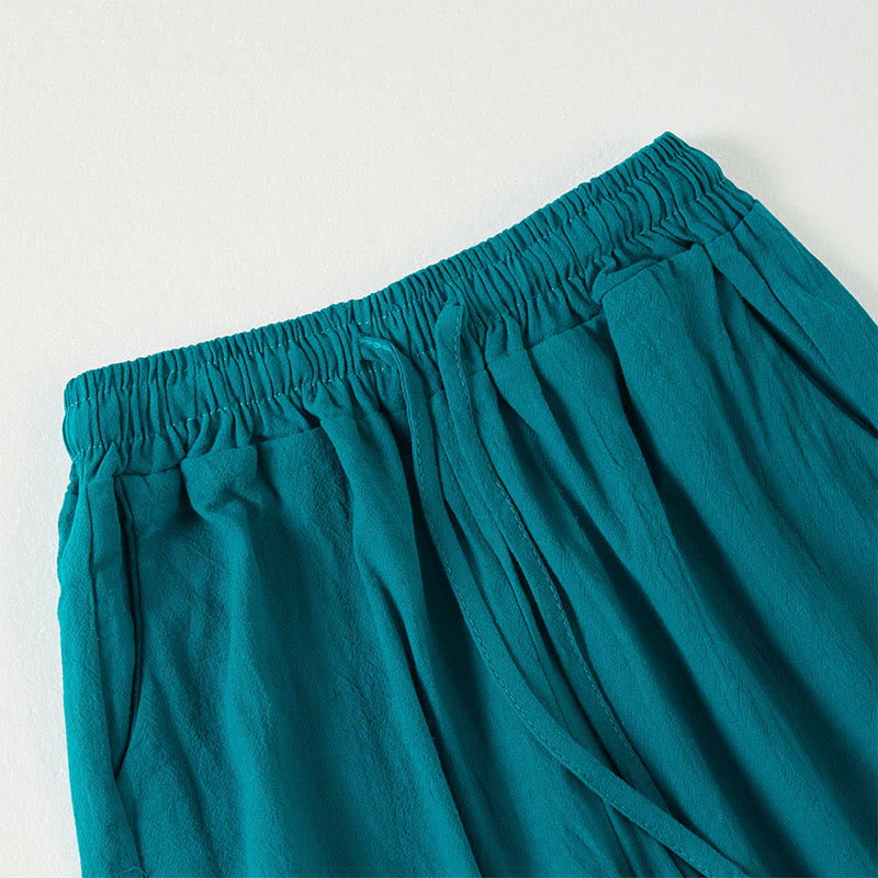 Spodnie damskie z szerokimi nogawkami i kieszeniami w gładkie, boho paski z motywem Buddha Stones - image 1