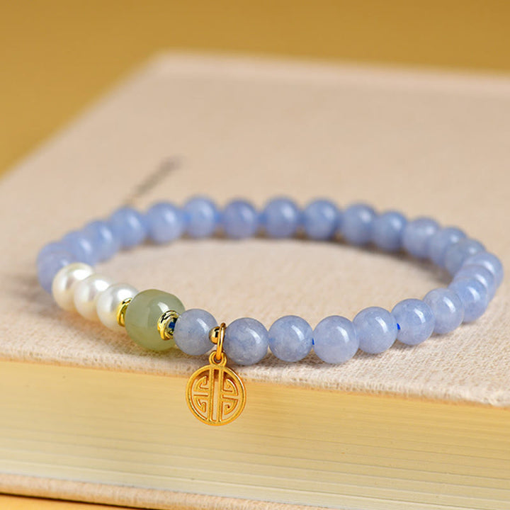 Buddha Stones Bransoletka energetyczna z koralików perłowych z niebieskiego chalcedonu - image 1