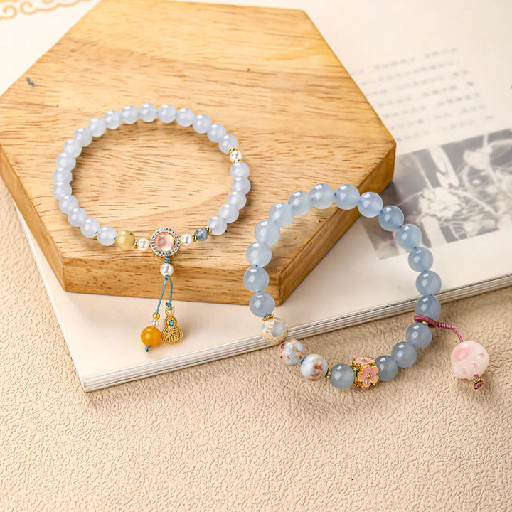 Buddha Stones Bransoletka lecznicza z niebieskim chalcedonem i postacią Fu w kształcie kociej łapki - image 5