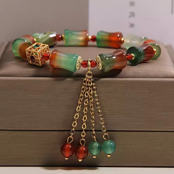 Buddha Stones Kolorowa bransoletka z koralików bambusowych z agatu pawiego i frędzlami Courage - Agat pawi (obwód nadgarstka 14-16 cm) - image 0