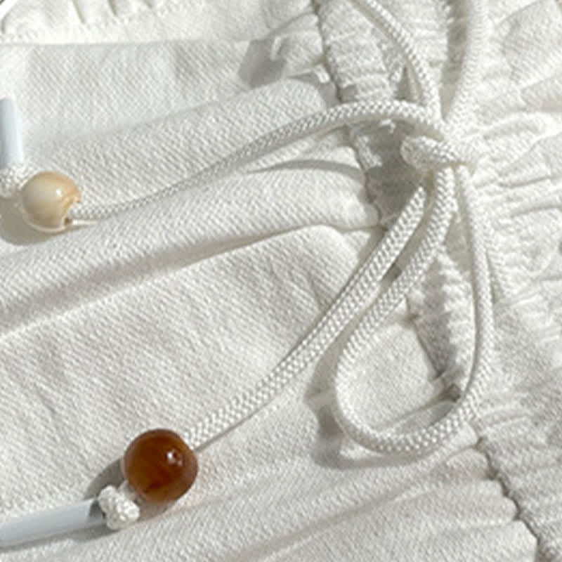 Buddha Stones Letnie damskie szorty z elastyczną talią i ściągaczem, z falbanką i kieszeniami - image 18