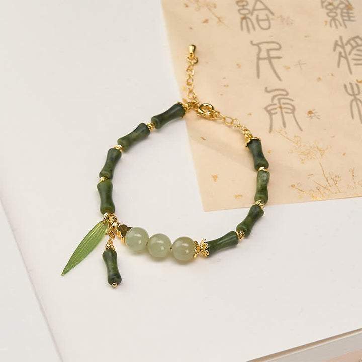 Buddha Stones Bransoletka Peace Bead z bambusa i peridotu z hetianowego jadeitu - Peridot (obwód nadgarstka 15-18 cm) - image 0
