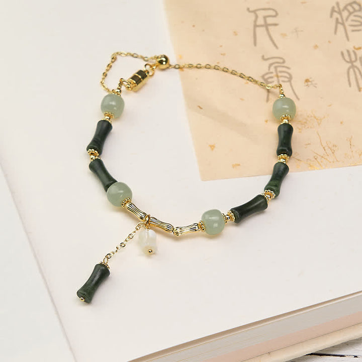 Buddha Stones Bransoletka z regulowanym uchwytem z jadeitu hetyjskiego, perydotu, bambusa i konwalii, bogactwa i wierności - Peridot (obwód nadgarstka 15-18 cm) - image 0